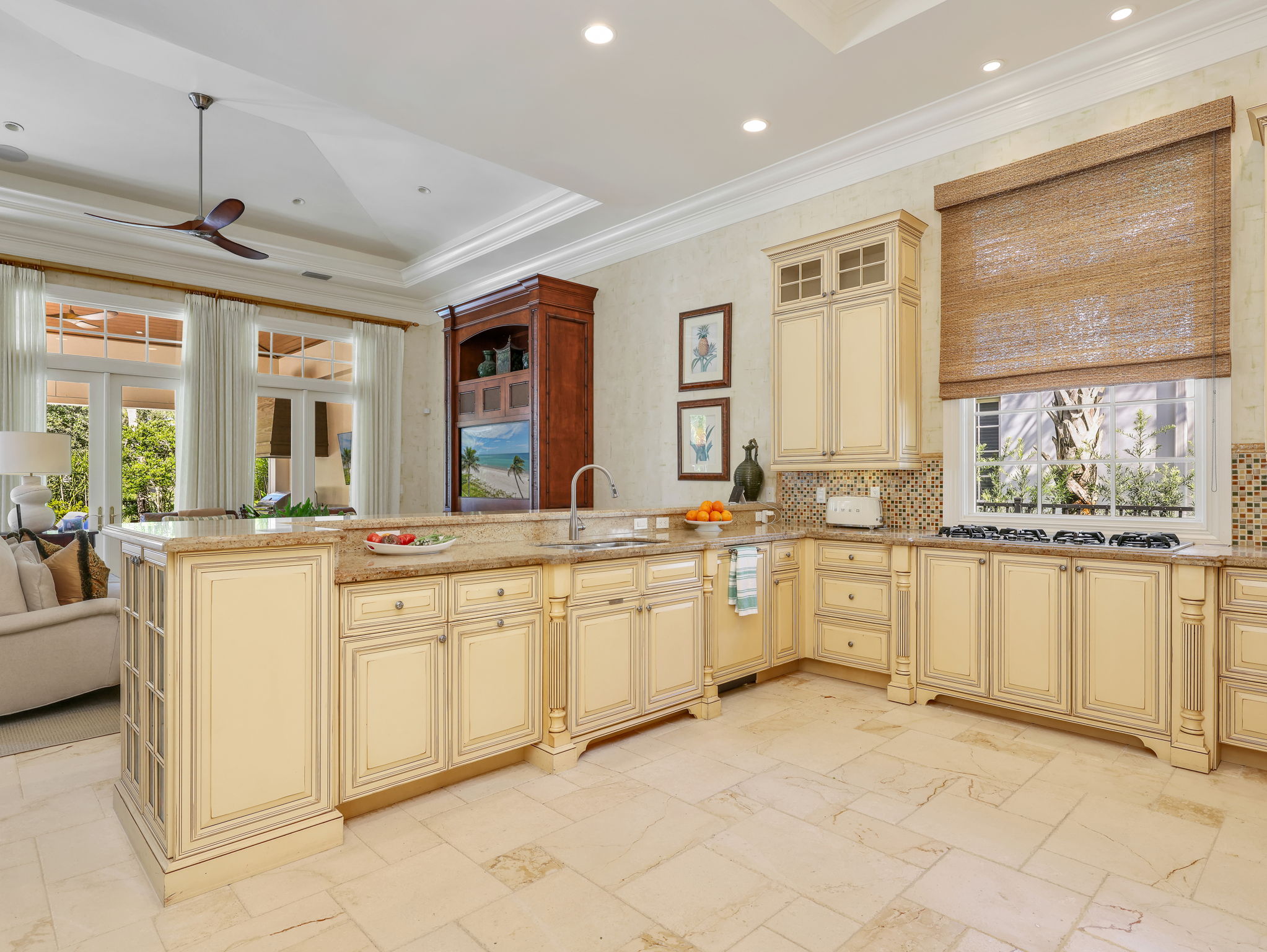 Kitchen peninsula opening to the family room