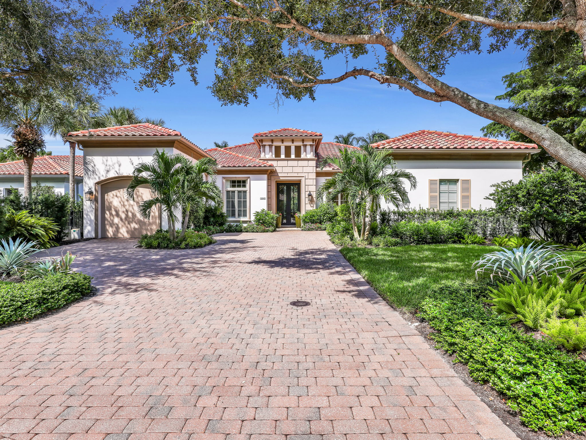 Front elevation and paver drive at 2245 Miramonte Court