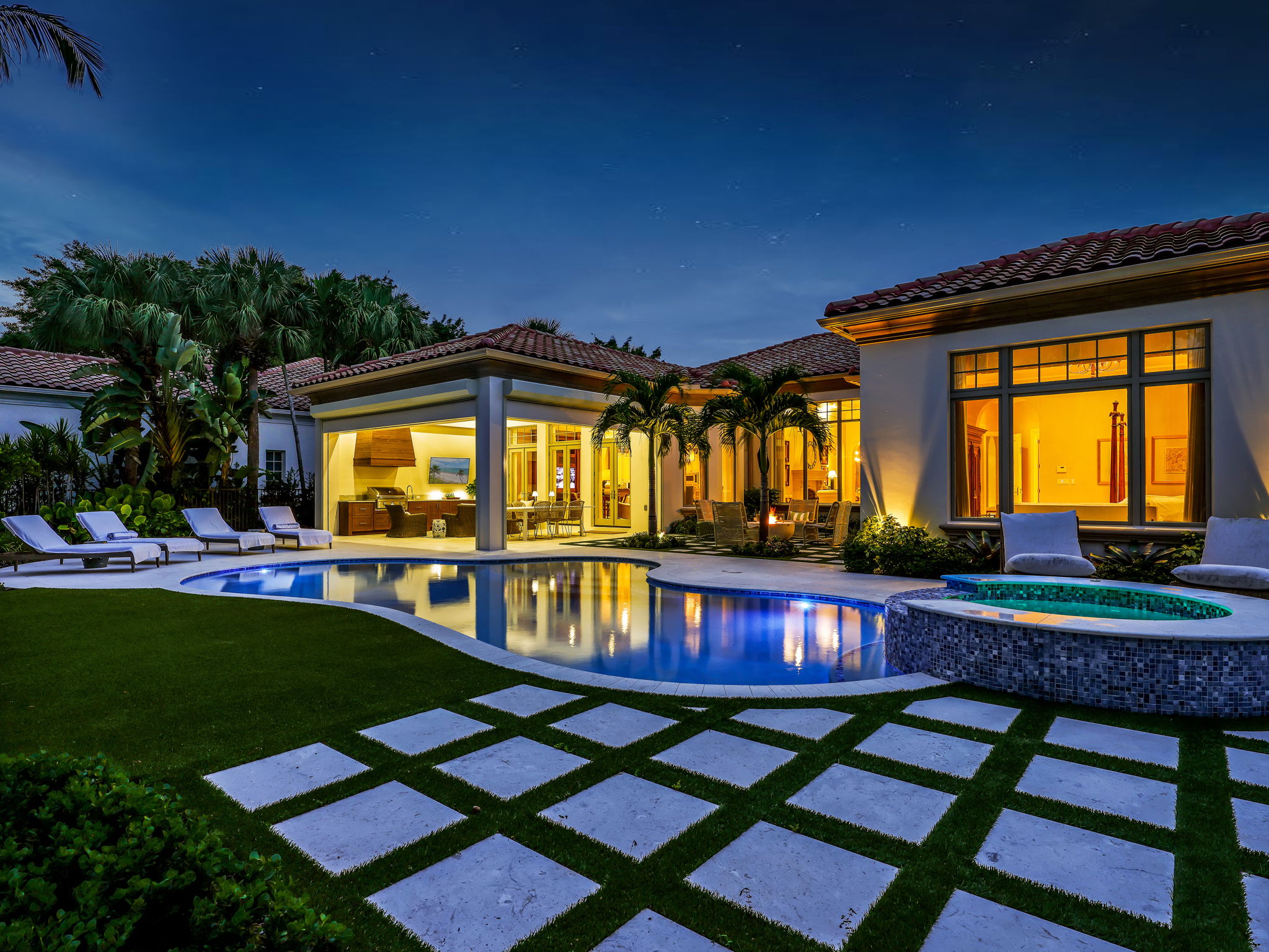 Twilight pool, spa, and lanai